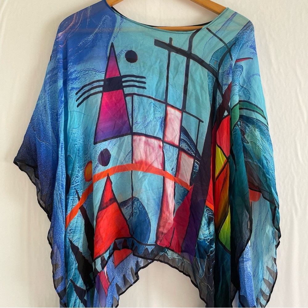 Dilema Blue Silk Geometric Poncho With Tassels